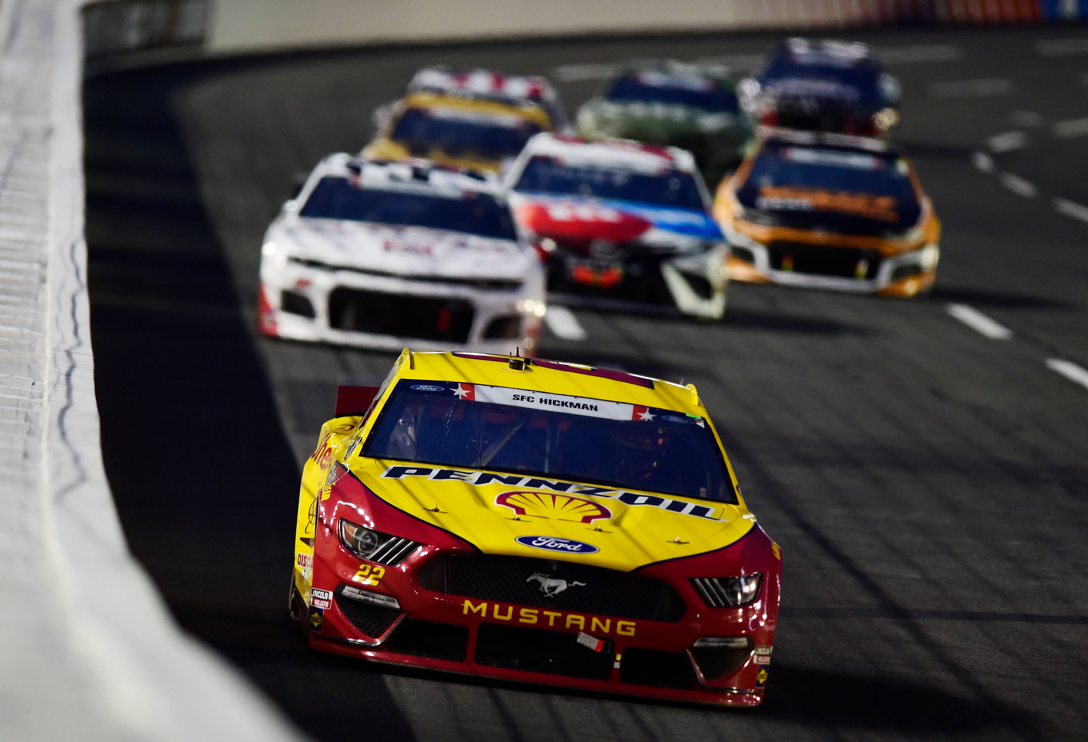 Keselowski and Joey Logano (22) are among three Ford drivers to clinch spots in the playoffs. Keselowski and Joey Logano (22) are among three Ford drivers to clinch spots in the playoffs.