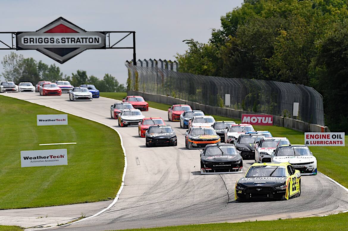 He pulled away in a final, two-lap shootout at Road America in Wisconsin. He pulled away in a final, two-lap shootout at Road America in Wisconsin.