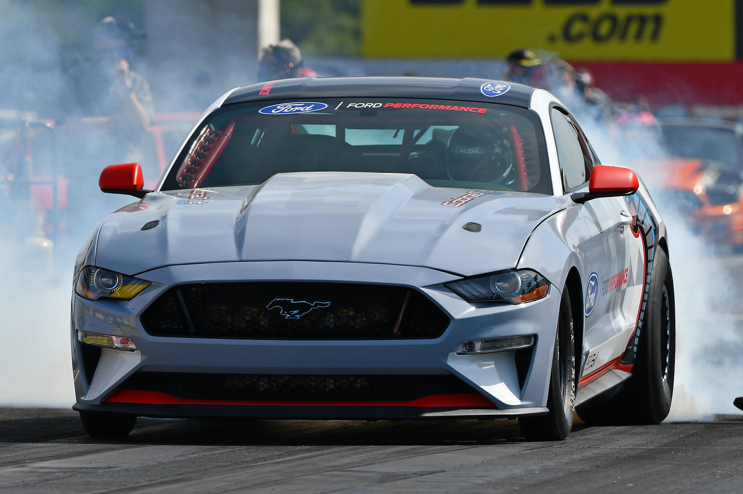 Tasca also drove the all-electric Mustang Cobra Jet 1400 in its debut, running three exhibitions. Tasca also drove the all-electric Mustang Cobra Jet 1400 in its debut, running three exhibitions.