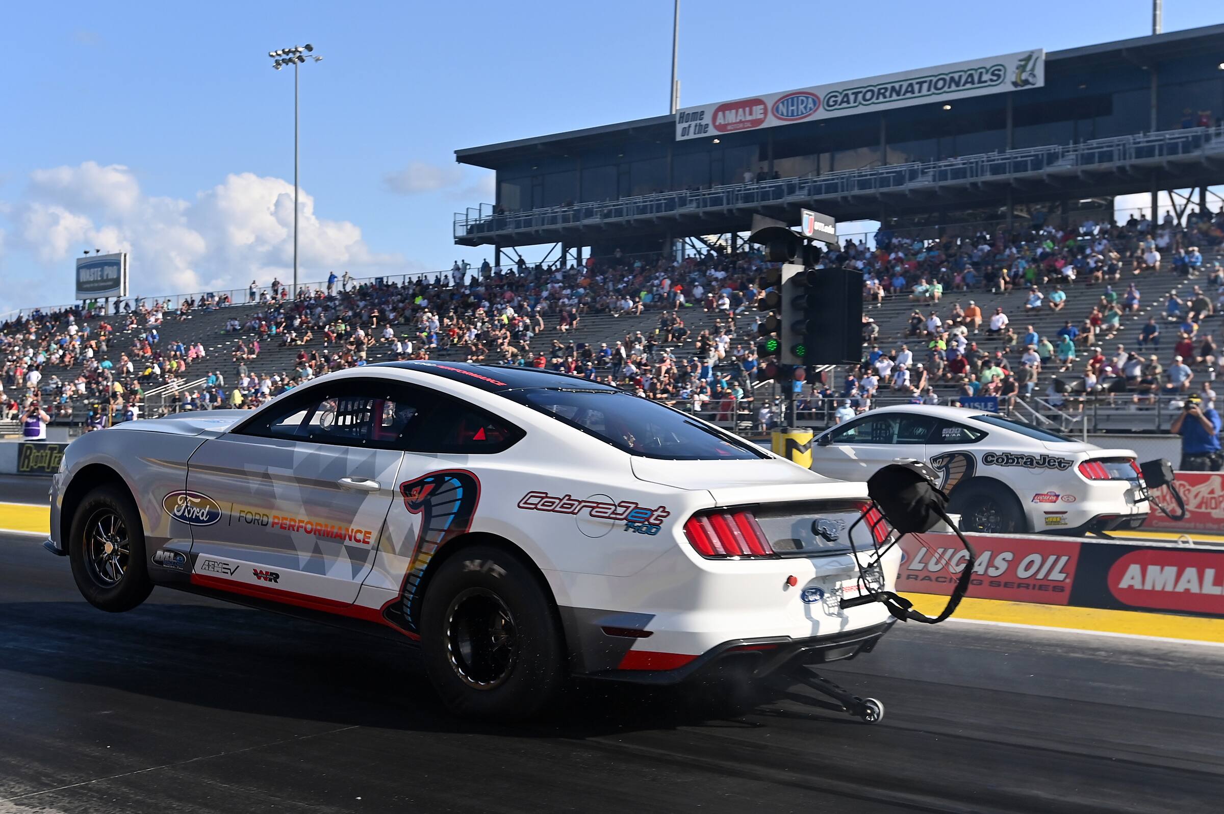 The all-electric Cobra Jet 1400 ran a record 8.37-second run with Tasca at the helm. The all-electric Cobra Jet 1400 ran a record 8.37-second run with Tasca at the helm.