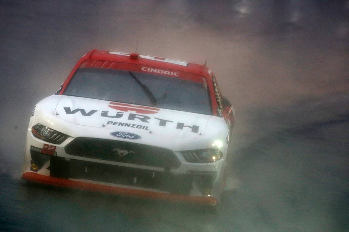 Penske's Austin Cindric led Ford with a sixth-place finish in the rainy NASCAR Xfinity race. Penske's Austin Cindric led Ford with a sixth-place finish in the rainy NASCAR Xfinity race.