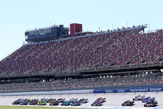 In NASCAR Trucks, ThorSport's Ben Rhodes finished fourth to lead Ford in a playoff cut-off race. In NASCAR Trucks, ThorSport's Ben Rhodes finished fourth to lead Ford in a playoff cut-off race.