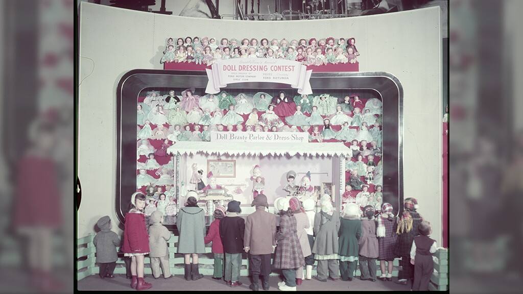 TBT: Ford Volunteers Dress Dolls for Christmas Donation