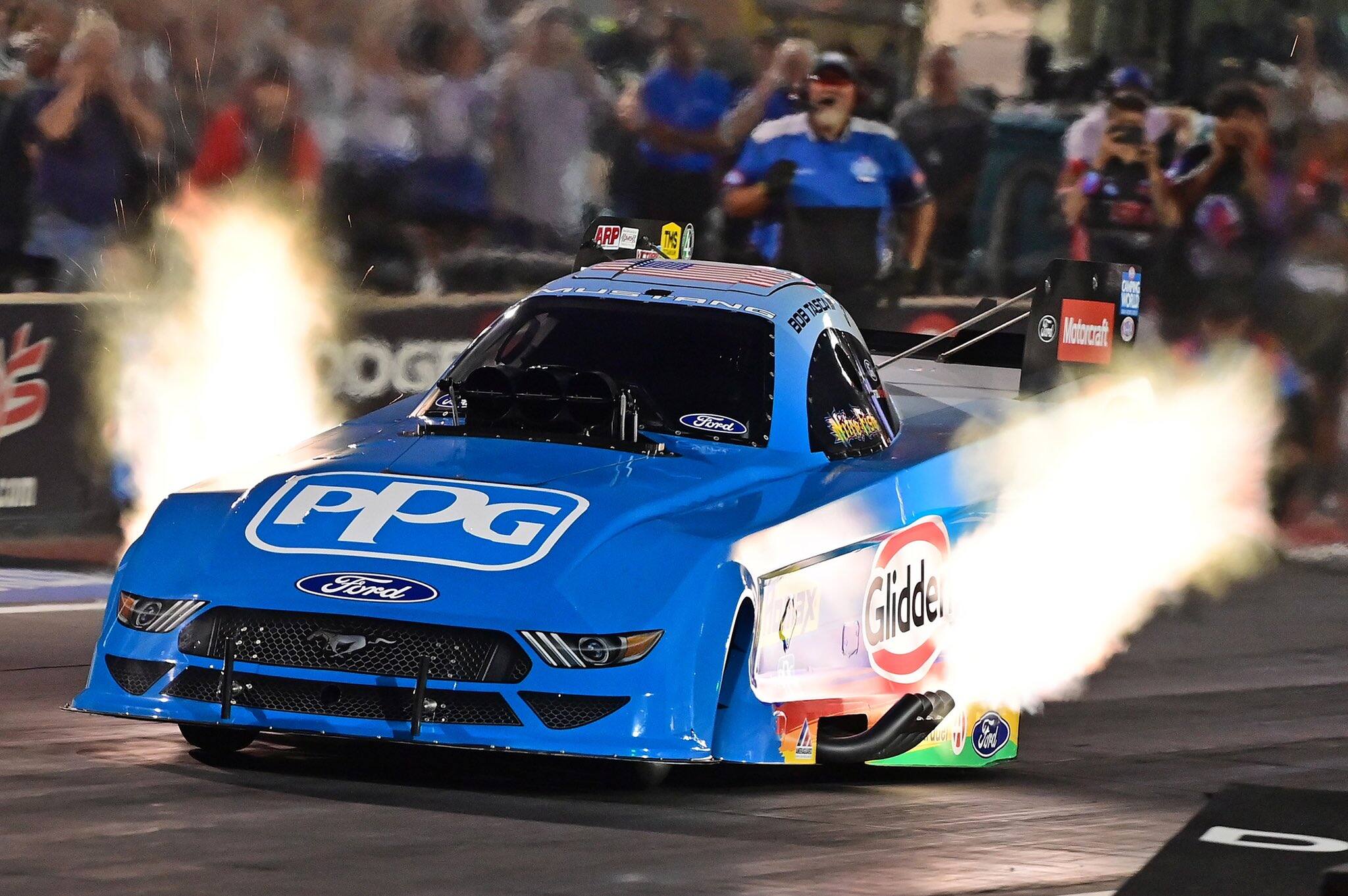 In NHRA action, Bob Tasca III won one round before exiting, but kept his lead in the standings. In NHRA action, Bob Tasca III won one round before exiting, but kept his lead in the standings.