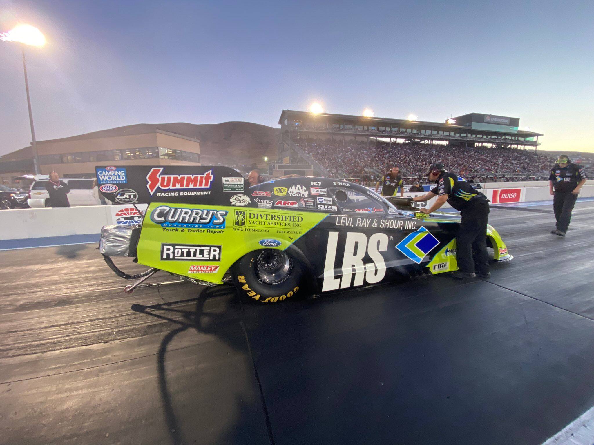 In NHRA action at Sonoma, California, Tim Wilkerson won one round before falling out of contention. In NHRA action at Sonoma, California, Tim Wilkerson won one round before falling out of contention.