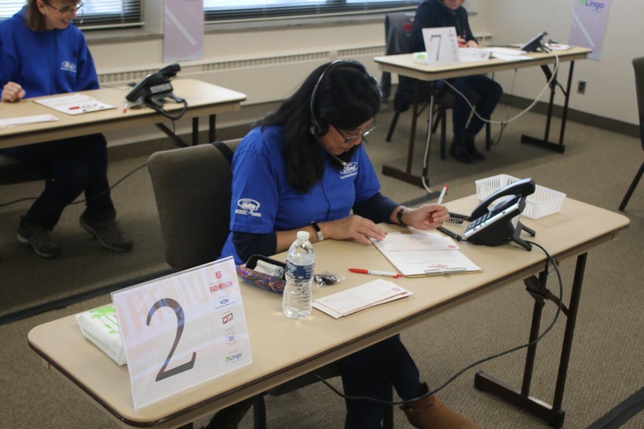Ford Volunteer Corps phone bank volunteers hard at work taking donations.