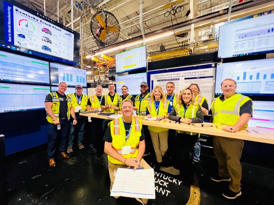 Ford representatives gather at Kentucky Truck Plant before a tour of the plant during the second leg of the FPS Bus Tour.  
