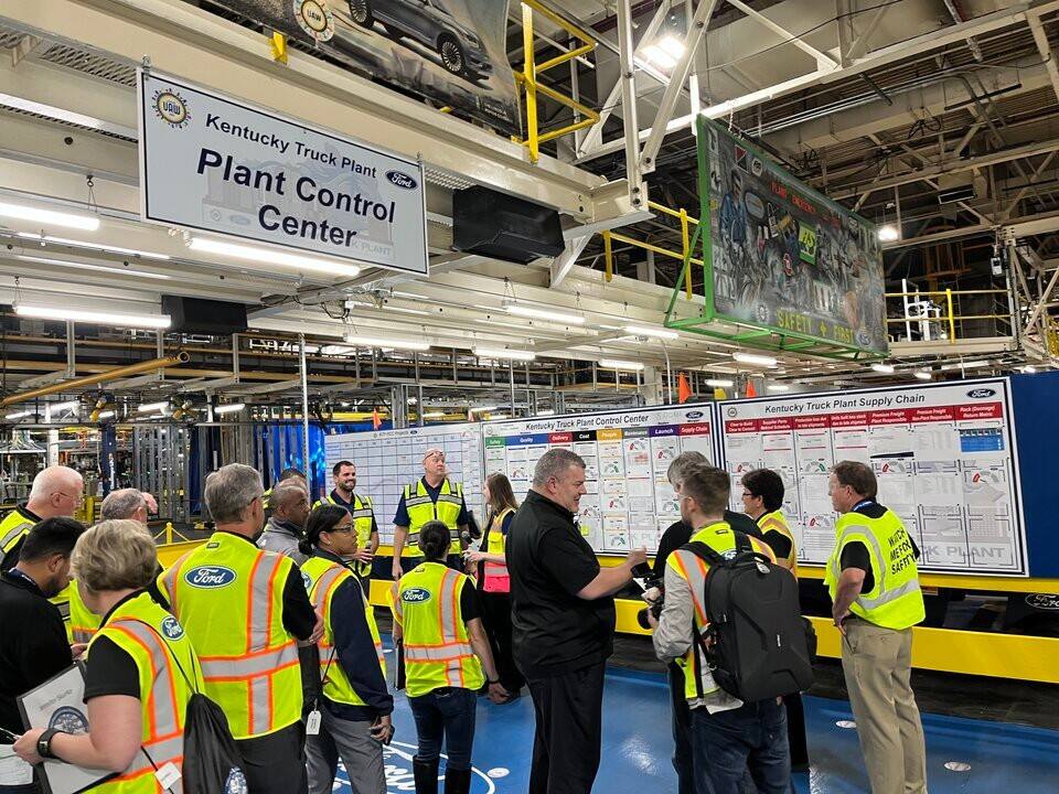 Bryce Currie, Ford’s vice president of Americas manufacturing and labor affairs, Ford Blue, speaks with FPS Bus Tour participants during an overview of the Kentucky Truck Plant Control Center.  