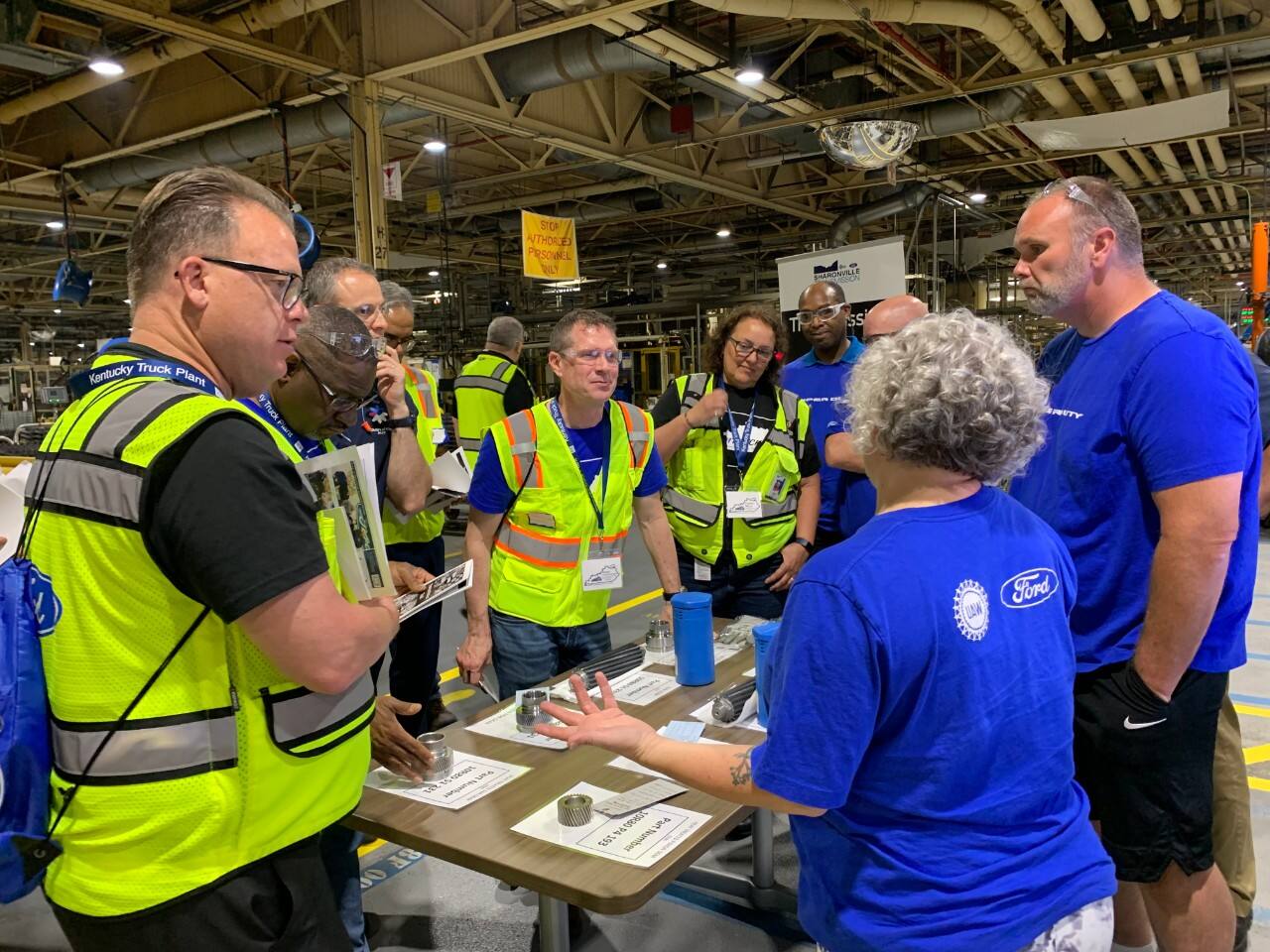 STP team members Nicole Creech and Dave Pence explain the heat treat process at Sharonville Transmission Plant.  