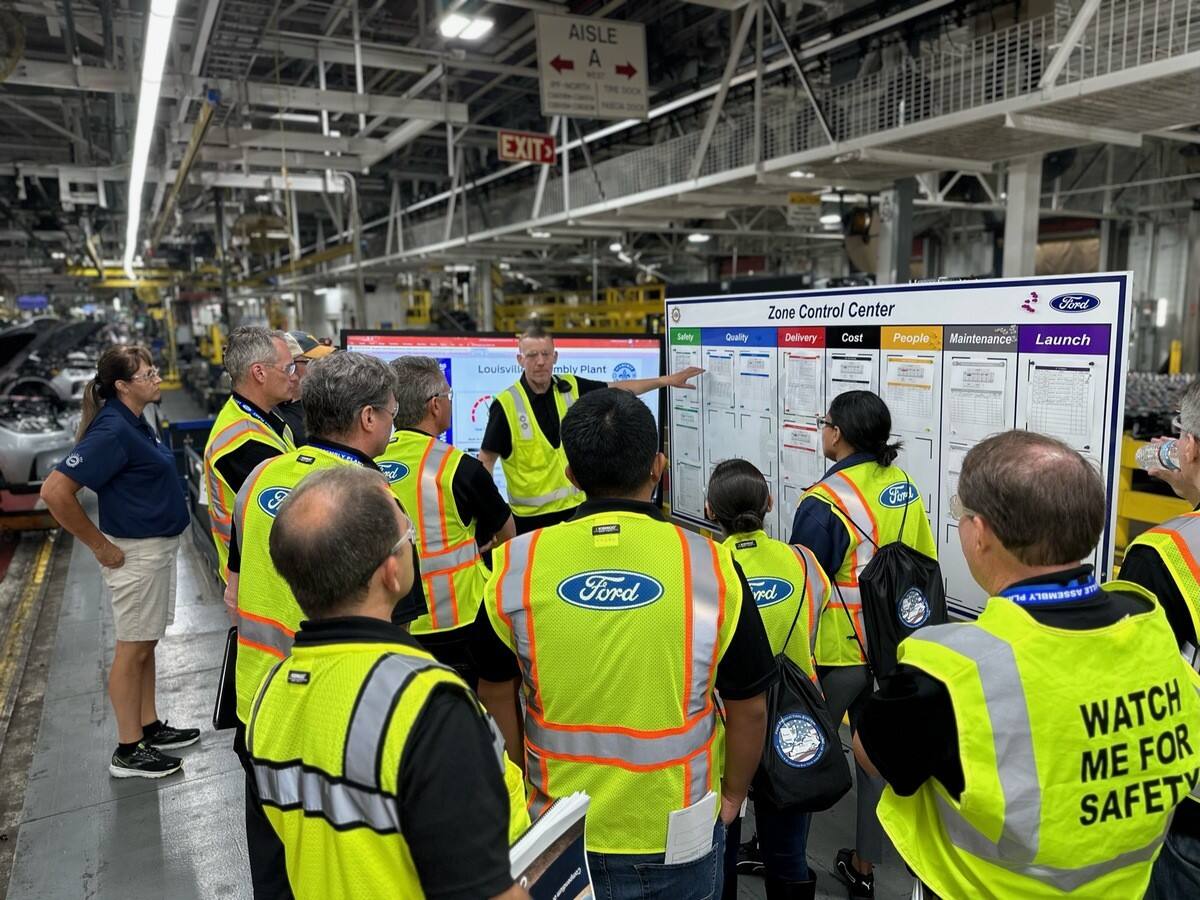During a tour of Louisville Assembly Plant, Ford representatives on the FPS Bus Tour listened to a presentation at one of the plant’s Zone Control Center boards.