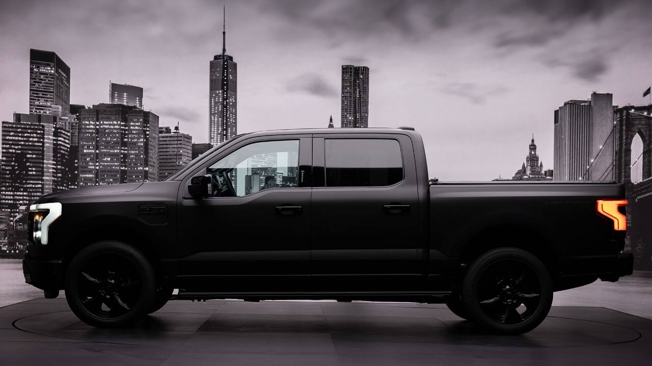 side view of F-150 Lightning with black wrap