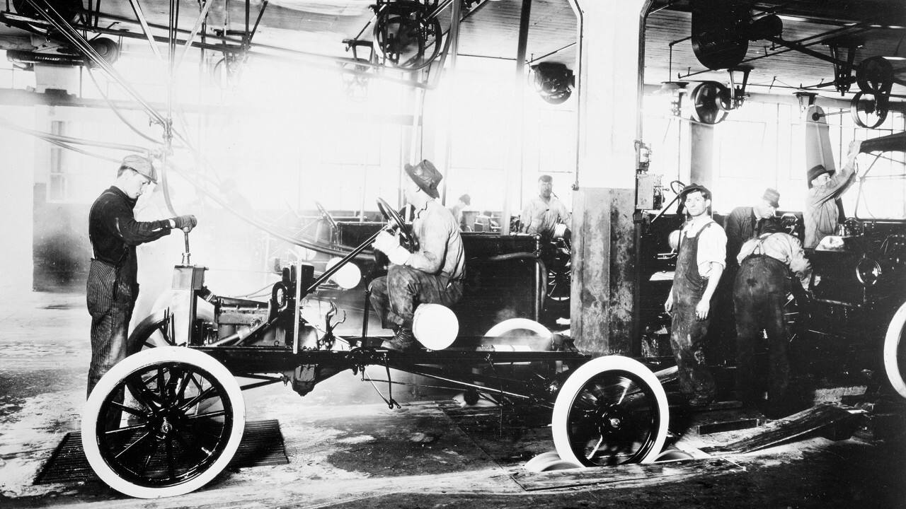 The 1914 Model T was the first to be built on the moving assembly line, seen here at the Highland Park plant. 
