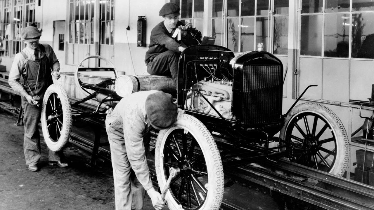 The 10 millionth Model T was built in 1924. The assembly line looked much different 50-plus years later when Ford rebuilt a 1909 model. 