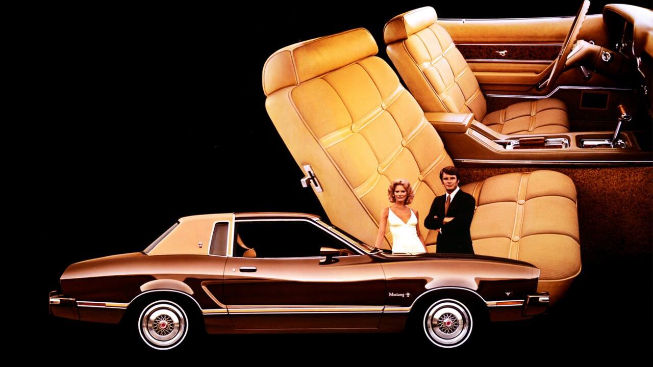 An ad features the luxury interior of the Mustang II