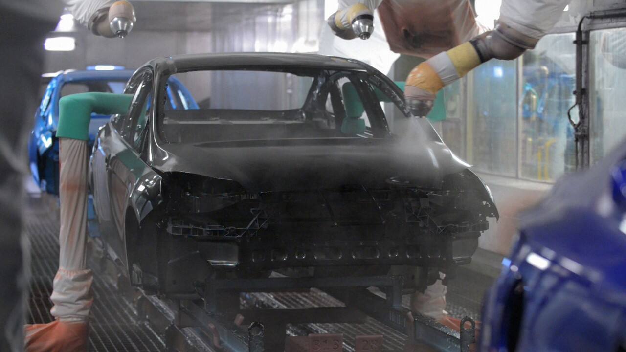 The higher-pigment paint allowed less paint to cover each vehicle