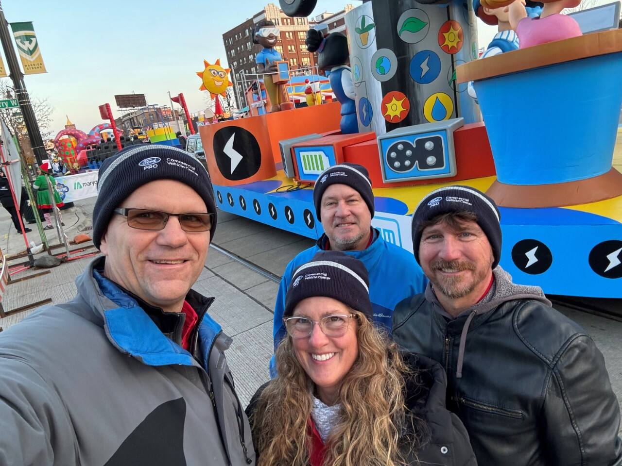 Ford volunters in front of the float