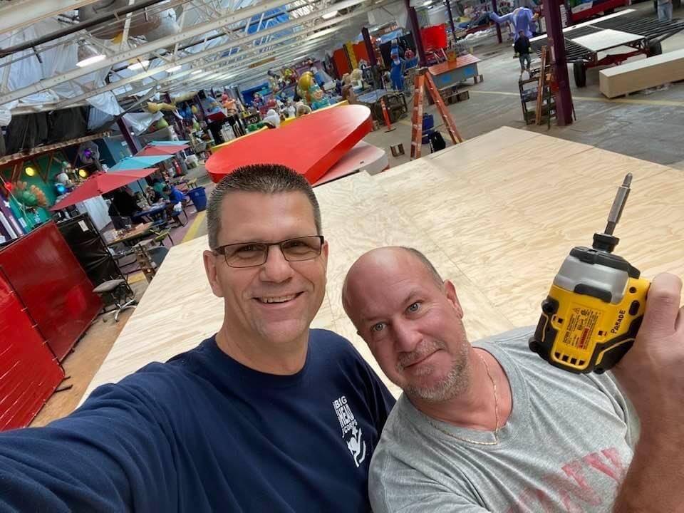 Ron and Mike are two volunteers who worked on the float