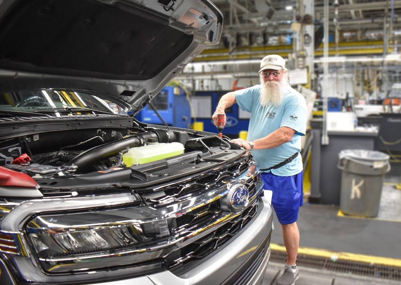 “Santa Larry” works on an engine in the Kentucky Truck Plant