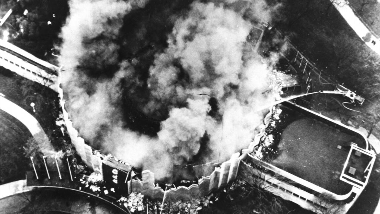 An aerial photo showing smoke plumes rising from the fire at the Rotunda