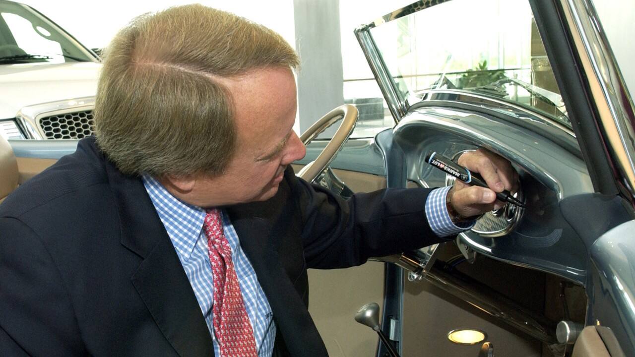 Edsel has long championed JDRF. Here he signs a Roadster which was auctioned to benefit the organization. 