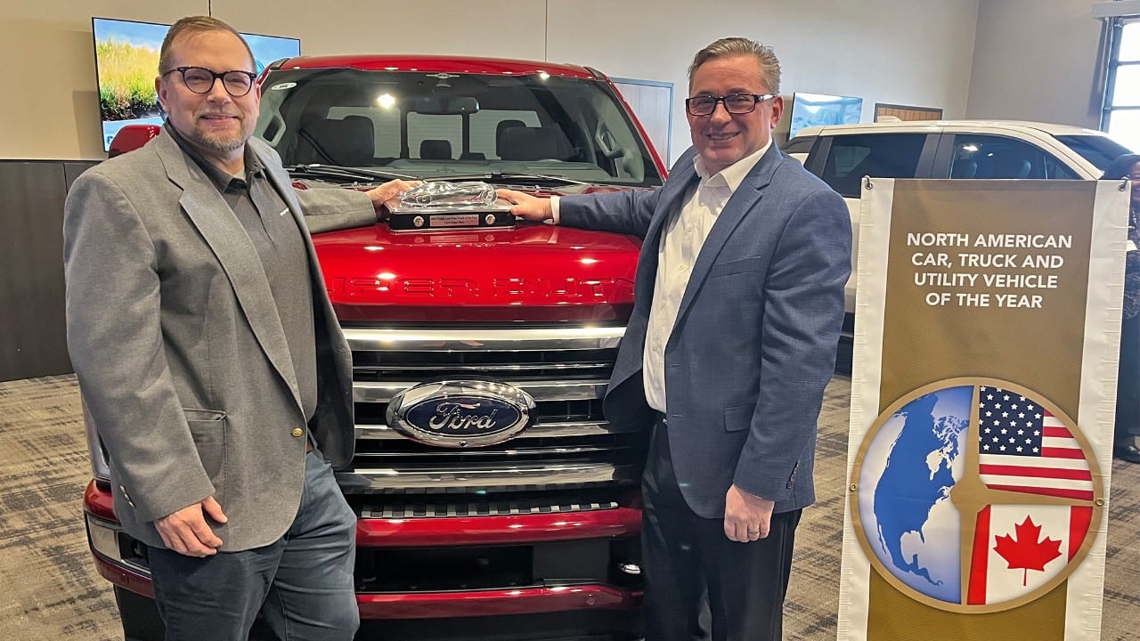 Super Duty Chief Program Engineer Andrew Kernahan (right) and Super Duty Chief Technical Officer Aaron Bresky accept the award for North American Truck of the Year at the M1 Concourse in Pontiac, MI.