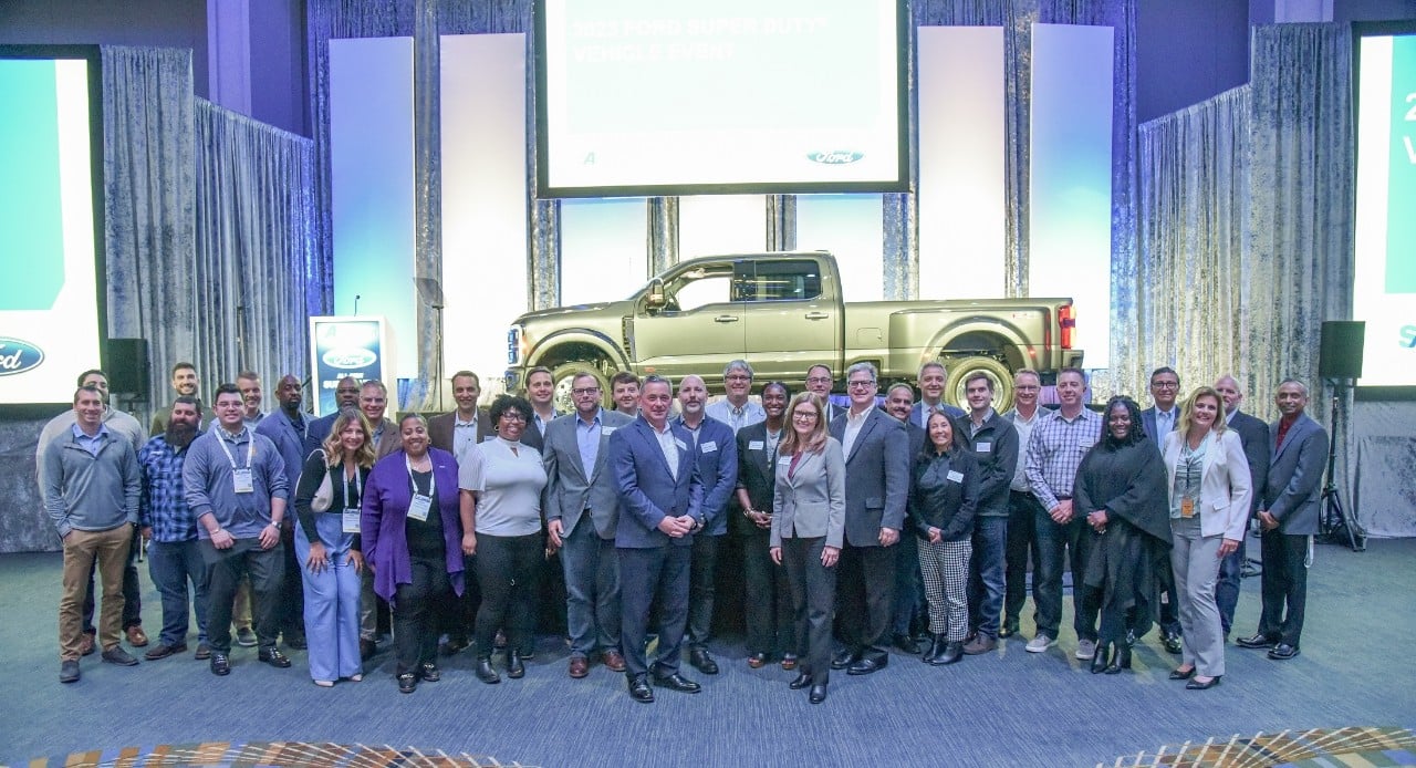 Team members at the Society of Automotive Engineers International Super Duty Vehicle Event in Detroit.  