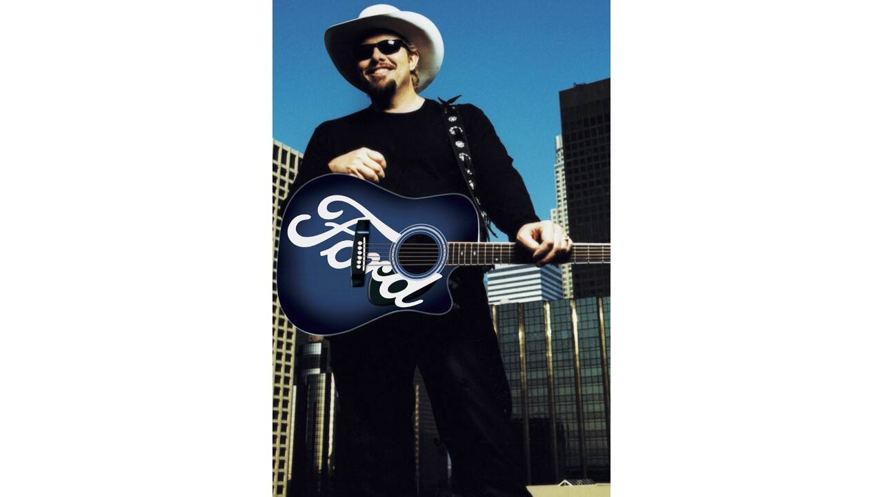 Keith headlined Ford’s centennial concert in 2003.