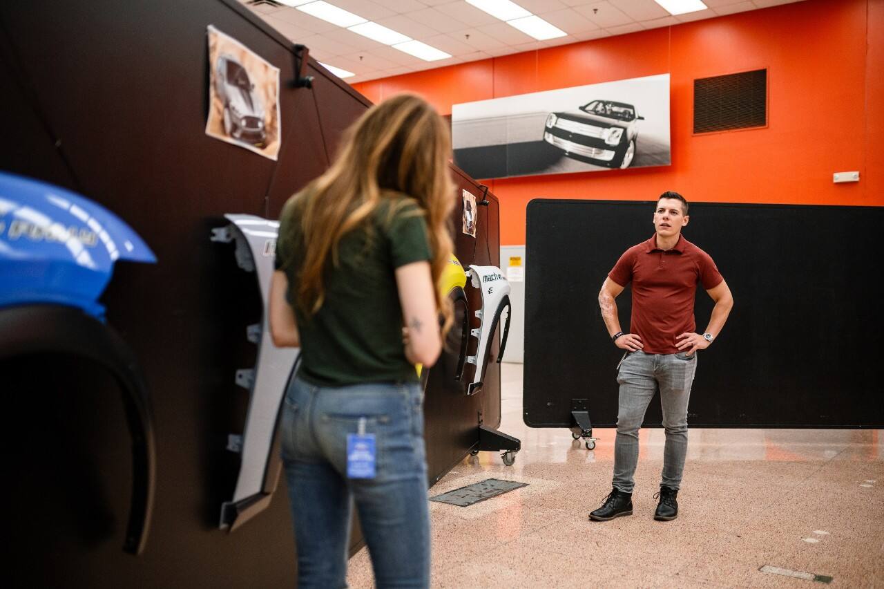 Schultz and Color and Materials Designer Angela Bell (left) discuss color options for the new rally-inspired Mustang Mach-E.